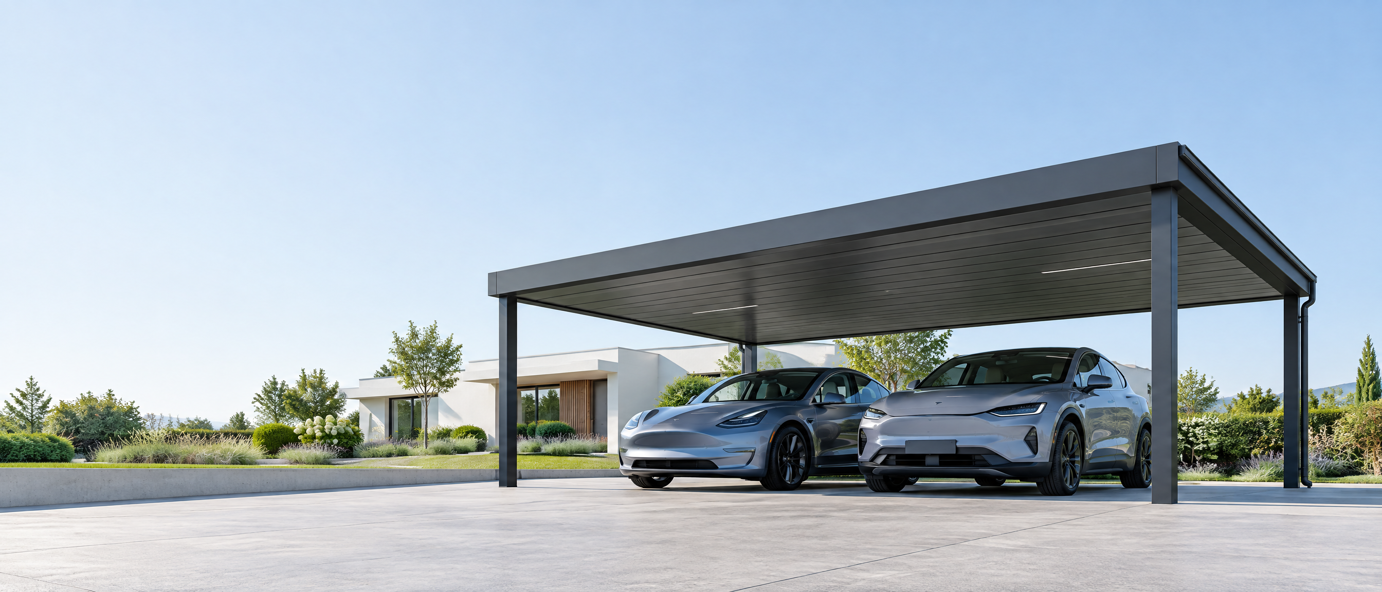 Dark aluminium Carportiva structure sheltering cars in a residential setting